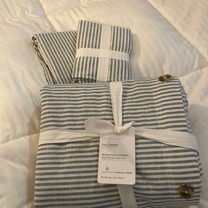 Pottery Barn duvet cover, size queen and two pillow cases.